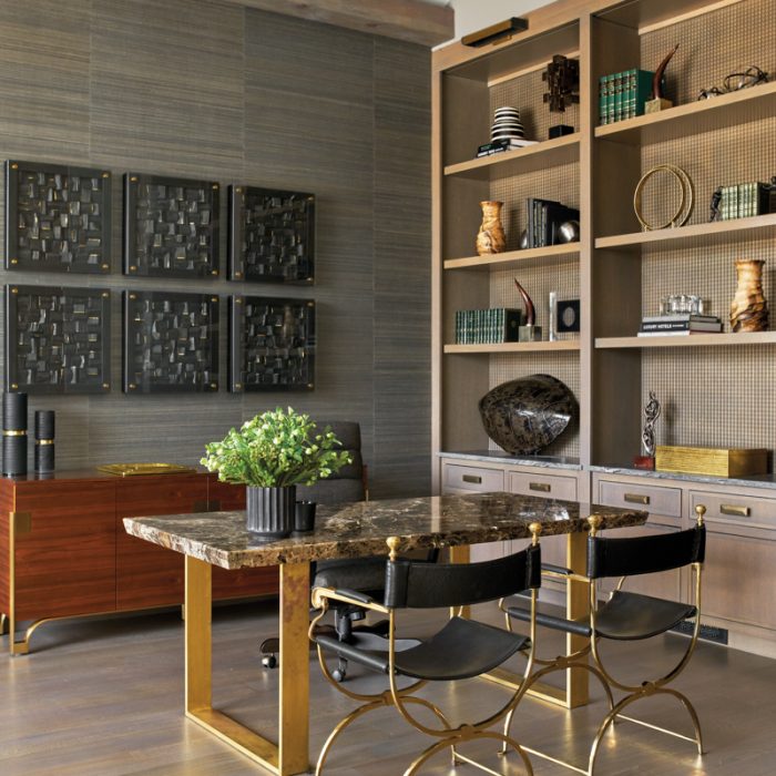 Luxury home study with marble table and custom shelving