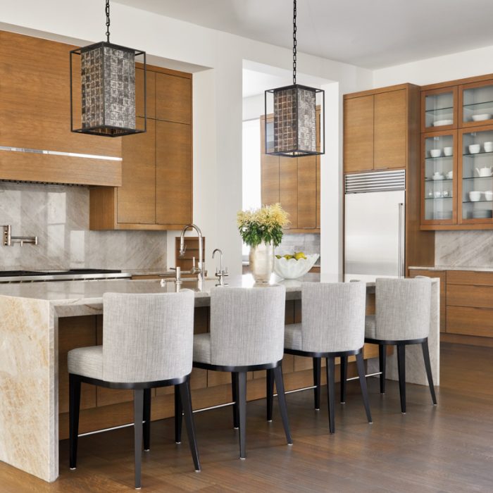 Luxury home great room with exposed wood beams and designer seating
